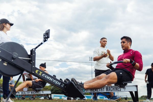 How can competitive rowers enhance their cardiovascular endurance through cross-training?