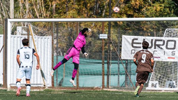 What specific drills can improve reaction time for goalkeepers in soccer?